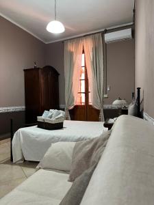 Ένα ή περισσότερα κρεβάτια σε δωμάτιο στο B&B Su Maimoni +46 φωτογραφίες