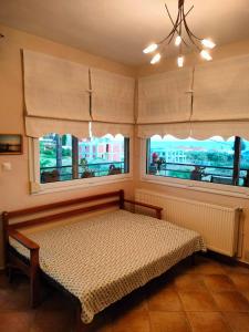 Ένα ή περισσότερα κρεβάτια σε δωμάτιο στο Seaside Villa Adam's Holiday House 2019 +80 φωτογραφίες