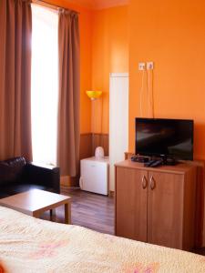 Hotel Rychta Netolice tesisinde bir televizyon ve/veya eğlence merkezi