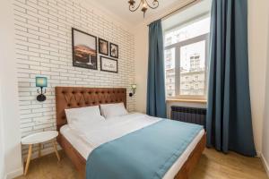 Postel nebo postele na pokoji v ubytování Scandinavian Apartments