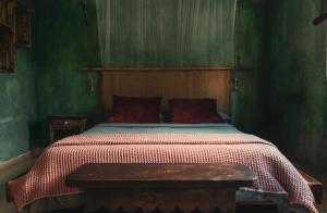 Cama o camas de una habitación en Hostal Esfigueral