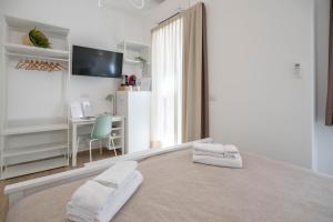 Posteľ alebo postele v izbe v ubytovaní Light Garden