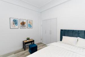 Ένα ή περισσότερα κρεβάτια σε δωμάτιο στο Amelia Dalat