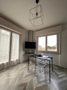 A television and/or entertainment centre at La Casa Verde Torbole