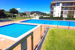 Zdjęcie z galerii obiektu APARTAMENTO PLAYA FOZ CON JARDIN Y PISCINA w mieście Foz