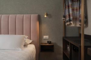Postel nebo postele na pokoji v ubytování Hotel Sole
