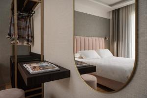 Postel nebo postele na pokoji v ubytování Hotel Sole