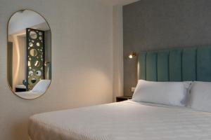 Postel nebo postele na pokoji v ubytování Hotel Sole