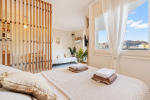 Posteľ alebo postele v izbe v ubytovaní WELCS APARTAMENTO 055 EMP con terraza y vistas al canal