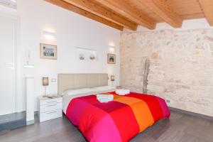 Postel nebo postele na pokoji v ubytování B&B Bianco E Blu