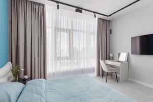 Postel nebo postele na pokoji v ubytování THE BEST APARTMENT ON THE SEASIDE IN ODESA! Luxury apartments in Arcadia, near seaside!