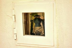 a person taking a picture in a mirror at La Chicca di Ste in Gallipoli
