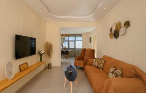 TV a/nebo společenská místnost v ubytování Auster House Santorini