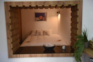 Postel nebo postele na pokoji v ubytování NeWave Apartment + 3 fotografie