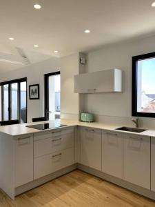 Η κουζίνα ή μικρή κουζίνα στο La Cabane des Surfeurs