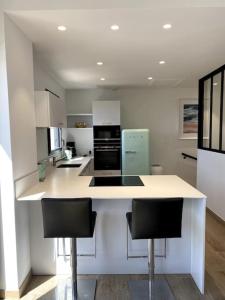 Η κουζίνα ή μικρή κουζίνα στο La Cabane des Surfeurs