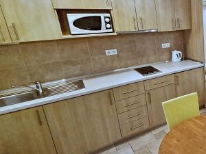 Kuchyňa alebo kuchynka v ubytovaní Rotondo Apartments
