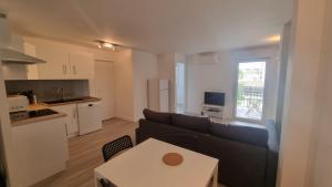 Kuchyňa alebo kuchynka v ubytovaní Résidence Anthérieu - Appartements neufs tout confort