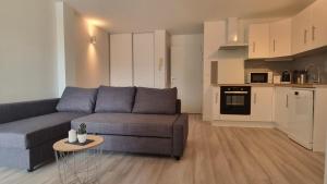 Kuchyňa alebo kuchynka v ubytovaní Résidence Anthérieu - Appartements neufs tout confort