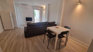 Televízia a/alebo spoločenská miestnosť v ubytovaní Résidence Anthérieu - Appartements neufs tout confort