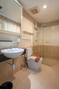 Koupelna v ubytování Santi White House Patong