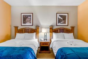 En eller flere senger på et rom på Chula Vista Resort #2219