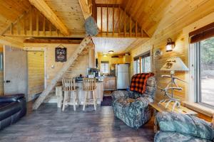 a kitchen and living room of a tiny house at North Fork Cabin in Cle Elum