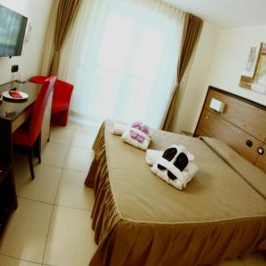 TV a/nebo společenská místnost v ubytování Hotel Novarello