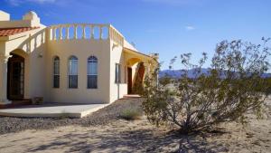 a house in the middle of the desert at Casa La Vida Dulce - How Sweet Life Can Be in San Felipe