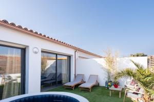 Posedenie v ubytovaní L'Avant Scène Meublé 5 étoiles Parking Gratuit Jacuzzi