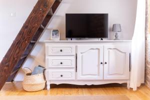TV a/nebo společenská místnost v ubytování Casa Milina