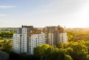 a view of a city with tall white buildings at FALE BAŁTYKU in Gdańsk