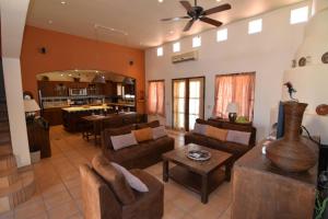 a living room with a couch and a table at El Dorado Ranch San Felipe Rental Home W/ In Home WiFi in Playa Unión