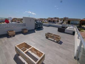a roof with wooden pallets on top of a building at La Hacienda San Felipe Mexico Vacation Rental in San Felipe