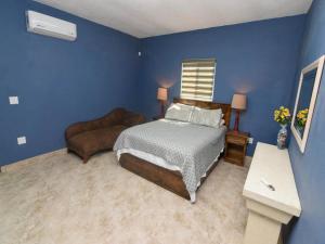 Ένα ή περισσότερα κρεβάτια σε δωμάτιο στο Cozy San Felipe House - Casa Montaña y Mar. +12 φωτογραφίες