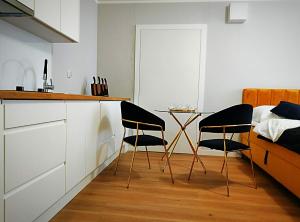 Kuchyňa alebo kuchynka v ubytovaní Hugo Star Apartments
