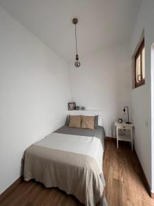 Un pat sau paturi într-o cameră la La Casita de Juana