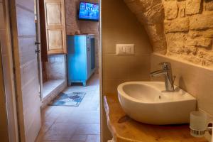 Koupelna v ubytování Trullo Dell'Erba + 15 fotografií
