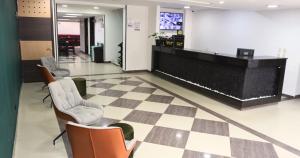 TV a/nebo společenská místnost v ubytování Hotel Expo Hotel Ferial