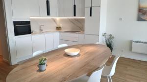 Cucina o angolo cottura di Zeezicht vanop het 6 de verdiep