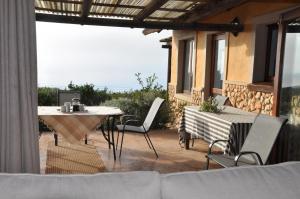 Balkón nebo terasa v ubytování Ocean View Cottage, Springerbaai