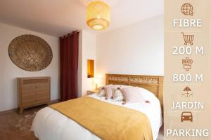 Posteľ alebo postele v izbe v ubytovaní Dreamtime - Jardin plein sud & proche commerces