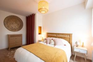 Posteľ alebo postele v izbe v ubytovaní Dreamtime - Jardin plein sud & proche commerces