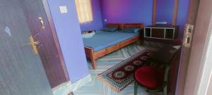 Ένα ή περισσότερα κρεβάτια σε δωμάτιο στο Lavender Guesthouse