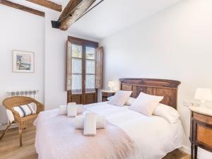 Postel nebo postele na pokoji v ubytování Cal Rellotger de Solsona