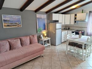 Kuchyň nebo kuchyňský kout v ubytování Apartments Nicole