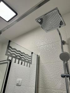 Koupelna v ubytování Corinne Garden Residence