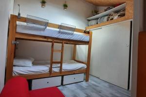 Posteľ alebo postele v izbe v ubytovaní Maisonnette entre étang et plage