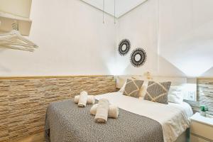 Posteľ alebo postele v izbe v ubytovaní Patio Andaluz - City Center + 7 fotografií