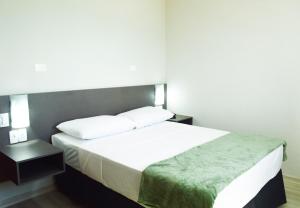 Postel nebo postele na pokoji v ubytování Pajuçara Hotel Express